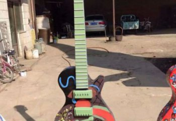 草地吉他雕塑 現(xiàn)代校園小品 大型雕塑