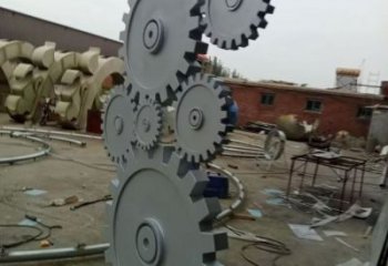 拉絲齒輪雕塑 鏤空創(chuàng)意機械雕塑 別墅區(qū)機械雕塑