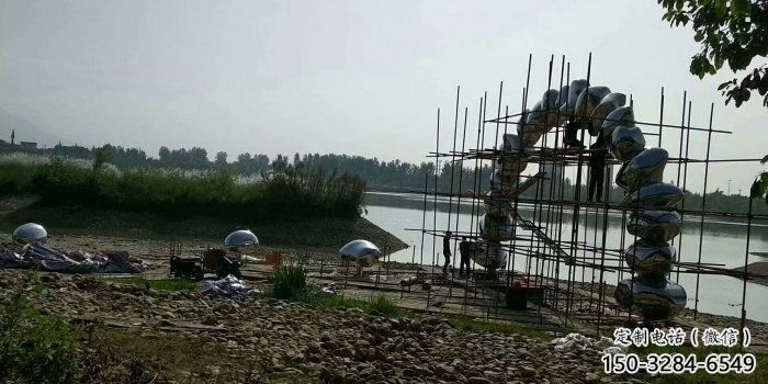 鵝卵石大門雕塑，公園美陳雕塑，不銹鋼鏡面拱門雕塑